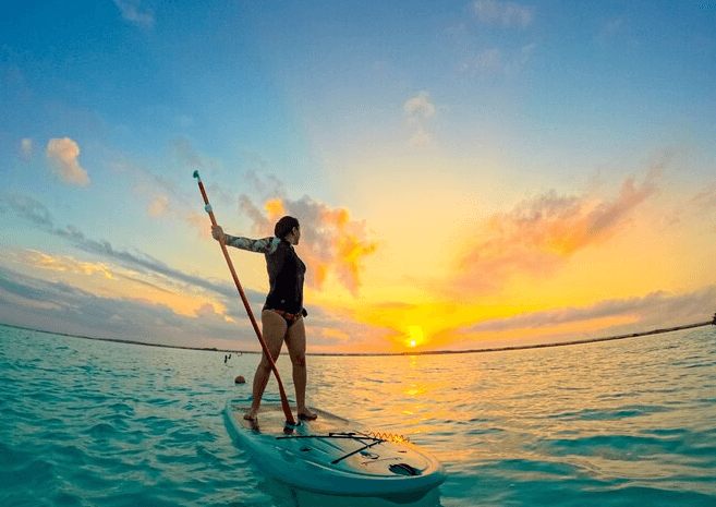 Sea kayaking by morning, beach camps and open-fire dinners by night.